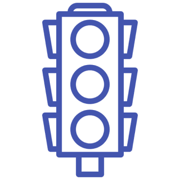 A blue traffic light on a green background